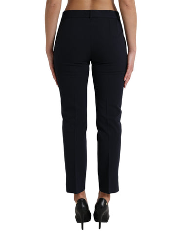 Blue mid waist tapered cropped pants by Dolce & Gabbana, featuring a stylish fit and modern design.
