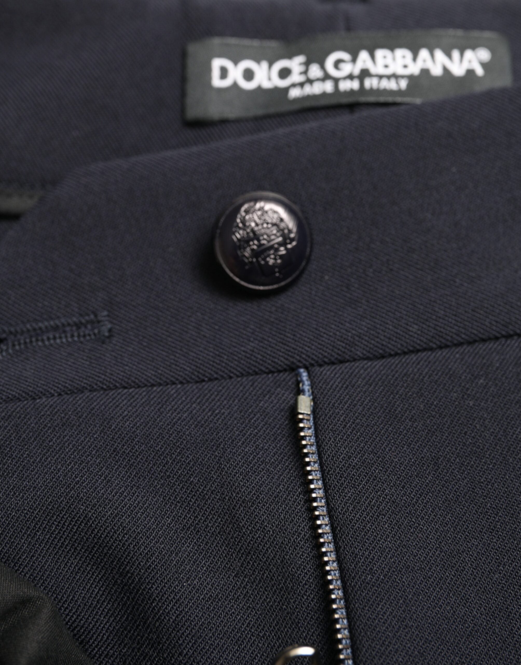 Blue mid waist tapered cropped pants by Dolce & Gabbana, featuring a stylish fit and modern design.