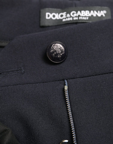 Blue mid waist tapered cropped pants by Dolce & Gabbana, featuring a stylish fit and modern design.