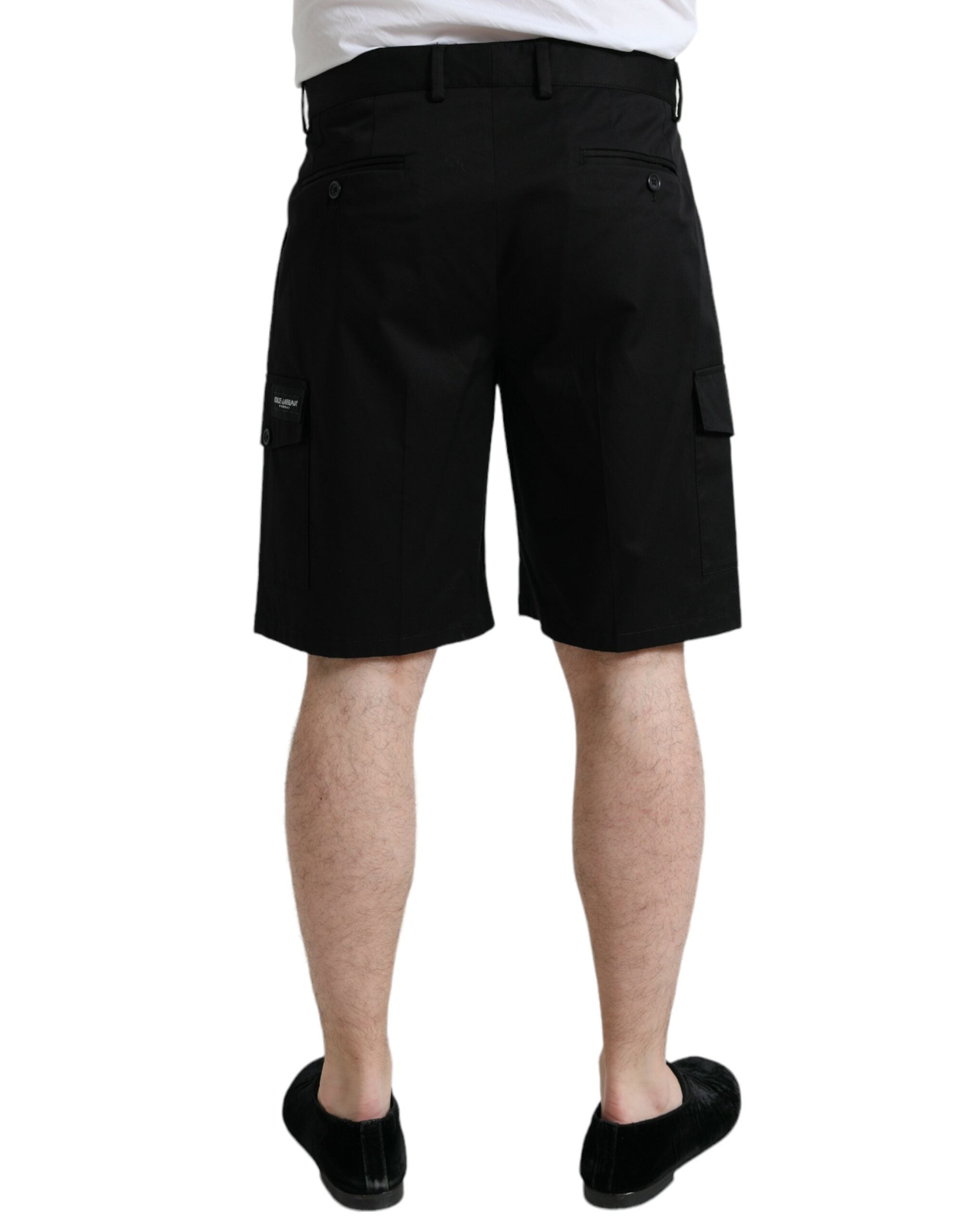 Black cotton stretch cargo Bermuda shorts by Dolce & Gabbana, featuring multiple pockets and a relaxed fit.