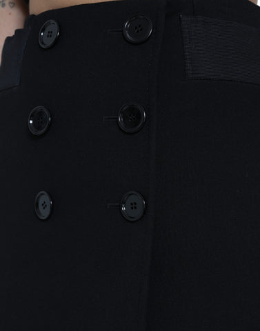 Black wool high waist A-line mini skirt by Dolce & Gabbana, featuring buttons and a stylish, fitted design.