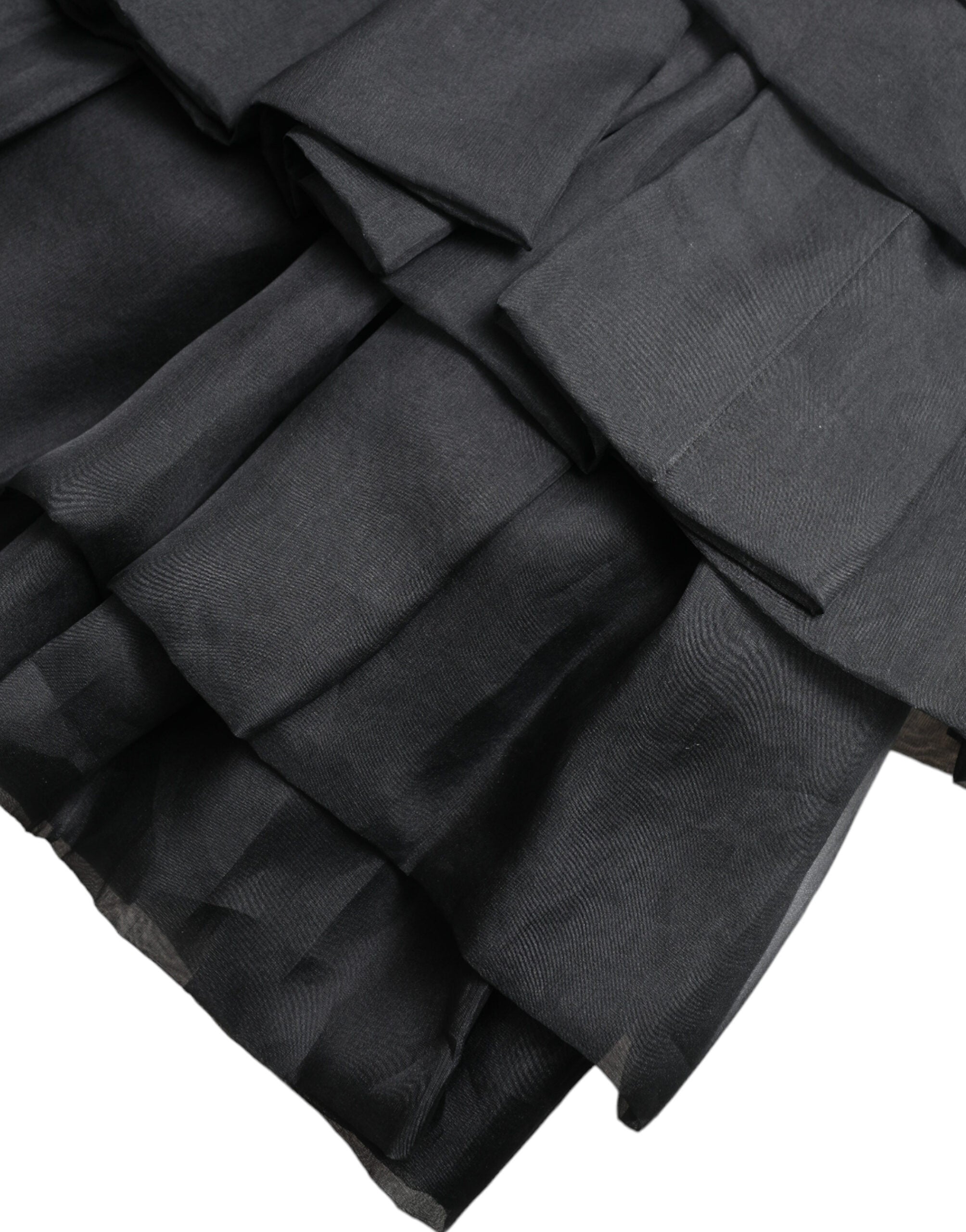 Black tiered A-line high waist silk mini skirt from Dolce & Gabbana, showcasing its flowy design and elegant silhouette.