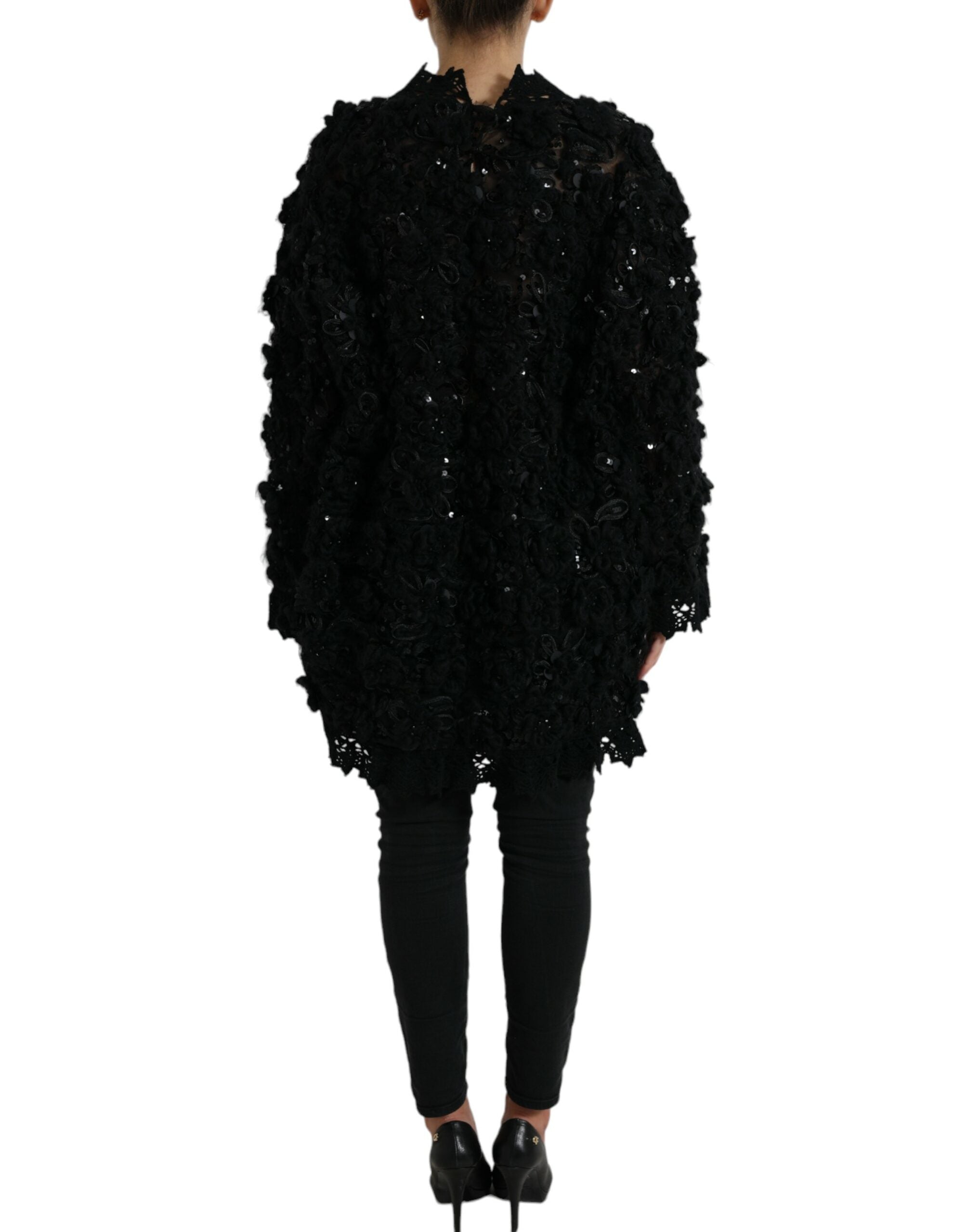 Black sequined embellished pullover sweater by Dolce & Gabbana with shimmering sequins and a cozy knit texture.