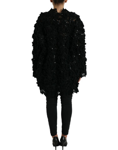 Black sequined embellished pullover sweater by Dolce & Gabbana with shimmering sequins and a cozy knit texture.