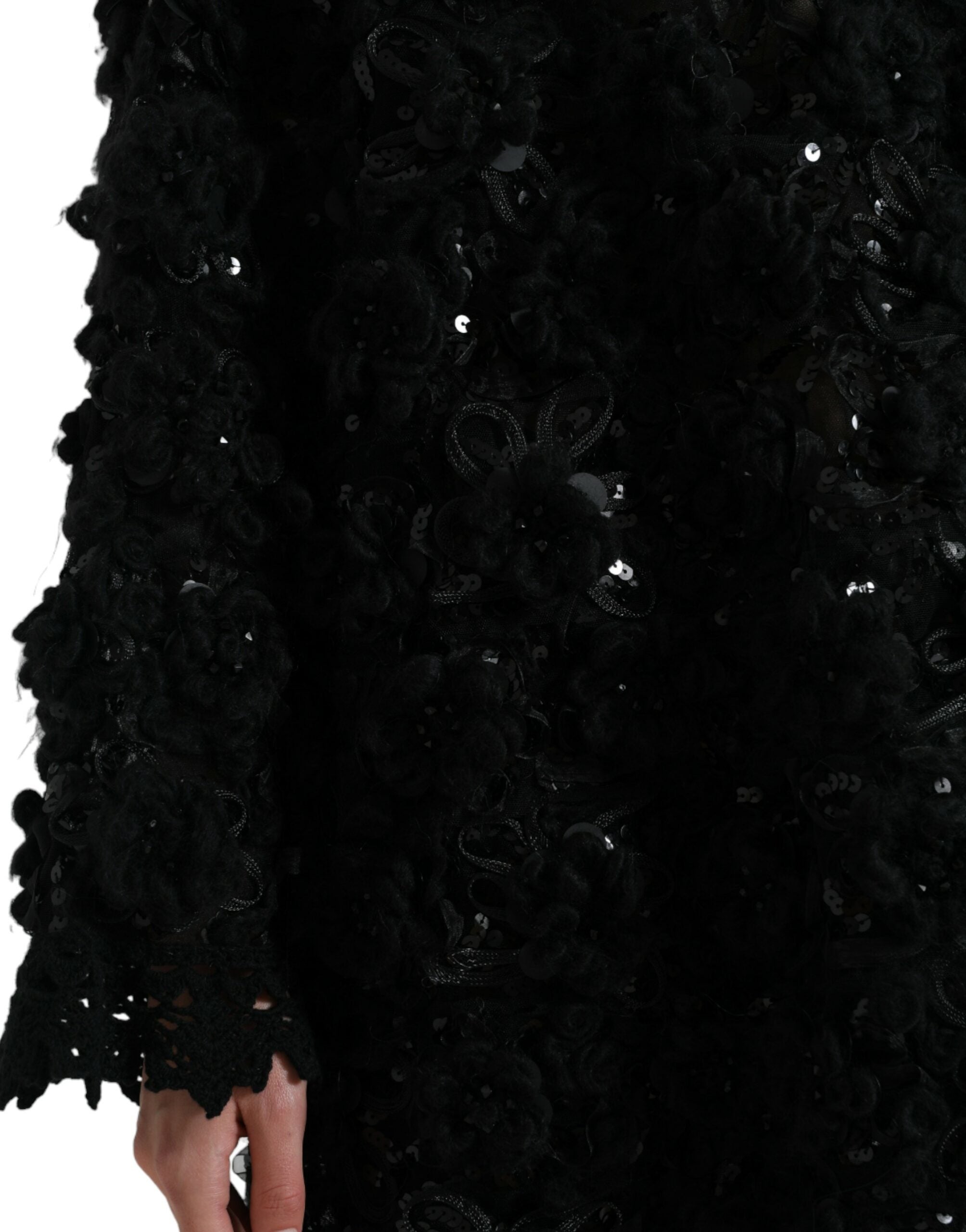 Black sequined embellished Dolce & Gabbana pullover sweater with shimmering sequins and cozy knit fabric.
