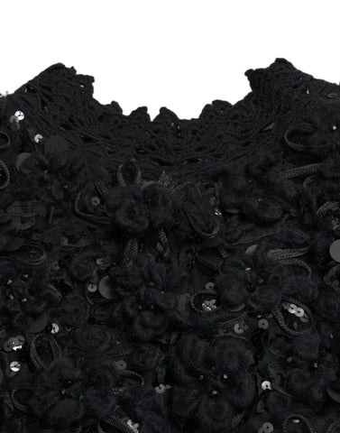 Black sequined embellished pullover sweater by Dolce & Gabbana with shimmering sequins and a cozy knit design.