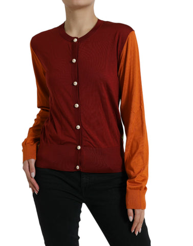 Multicolor color block silk crewneck cardigan by Dolce & Gabbana, featuring vibrant knit design and classic fit.