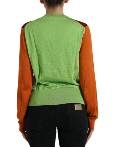Dolce & Gabbana multicolor color block silk cardigan with crewneck, featuring vibrant blocks and soft, luxurious fabric.