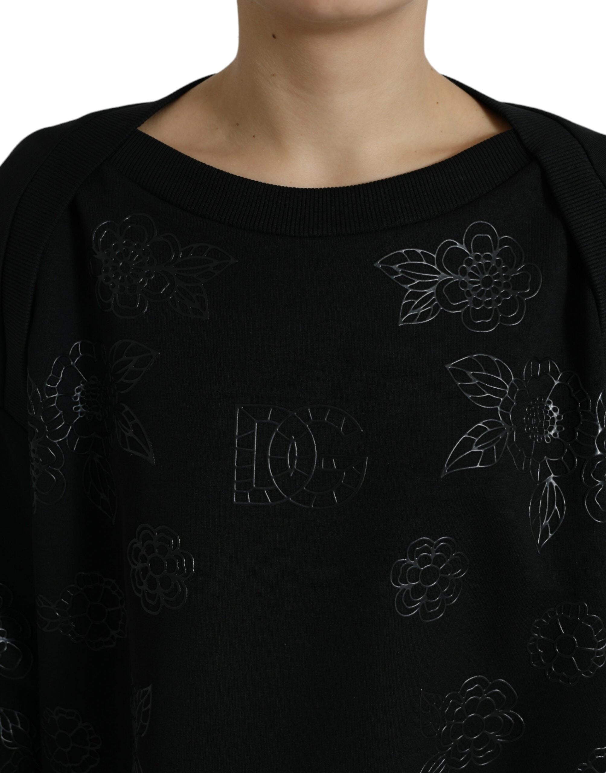 Black Dolce & Gabbana floral logo applique pullover sweater featuring a cozy knit and stylish floral detail.