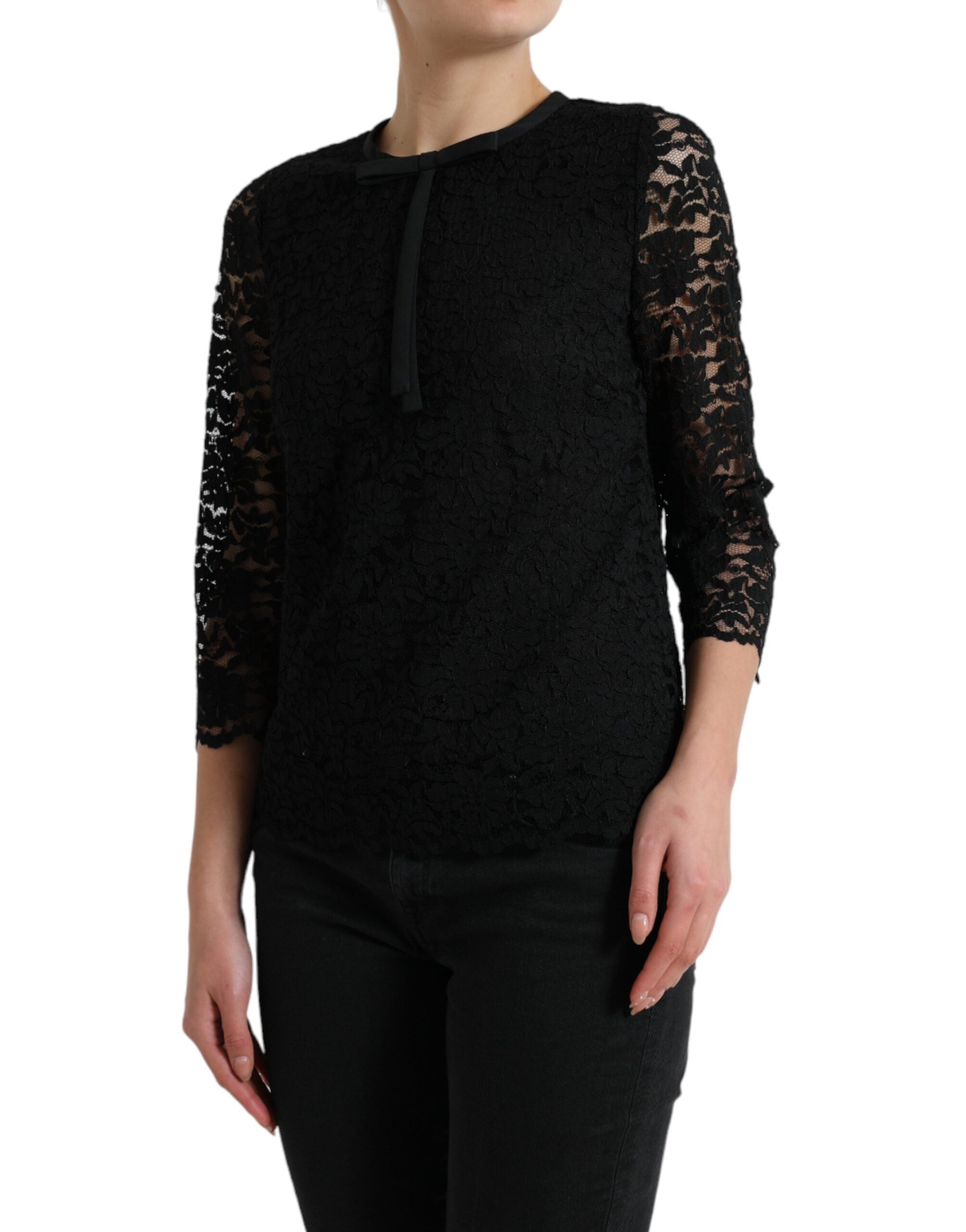 Black Dolce & Gabbana floral lace nylon blouse with long sleeves and intricate lace details.
