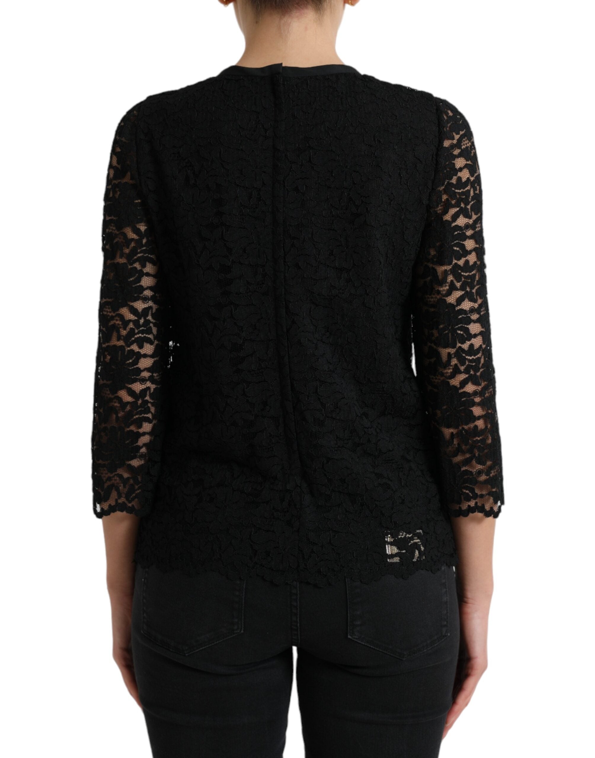 Black Dolce & Gabbana floral lace nylon blouse with long sleeves and elegant design, displayed on a plain background.