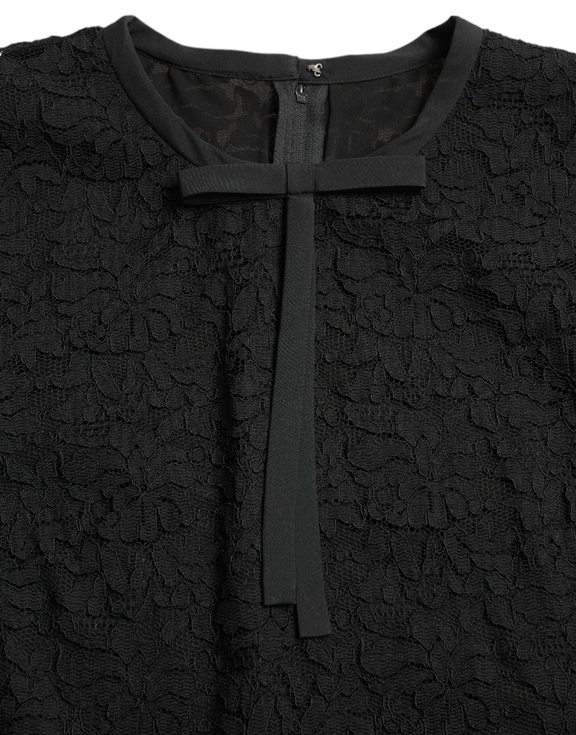 Black Dolce & Gabbana floral lace nylon blouse with long sleeves and intricate lace detailing.