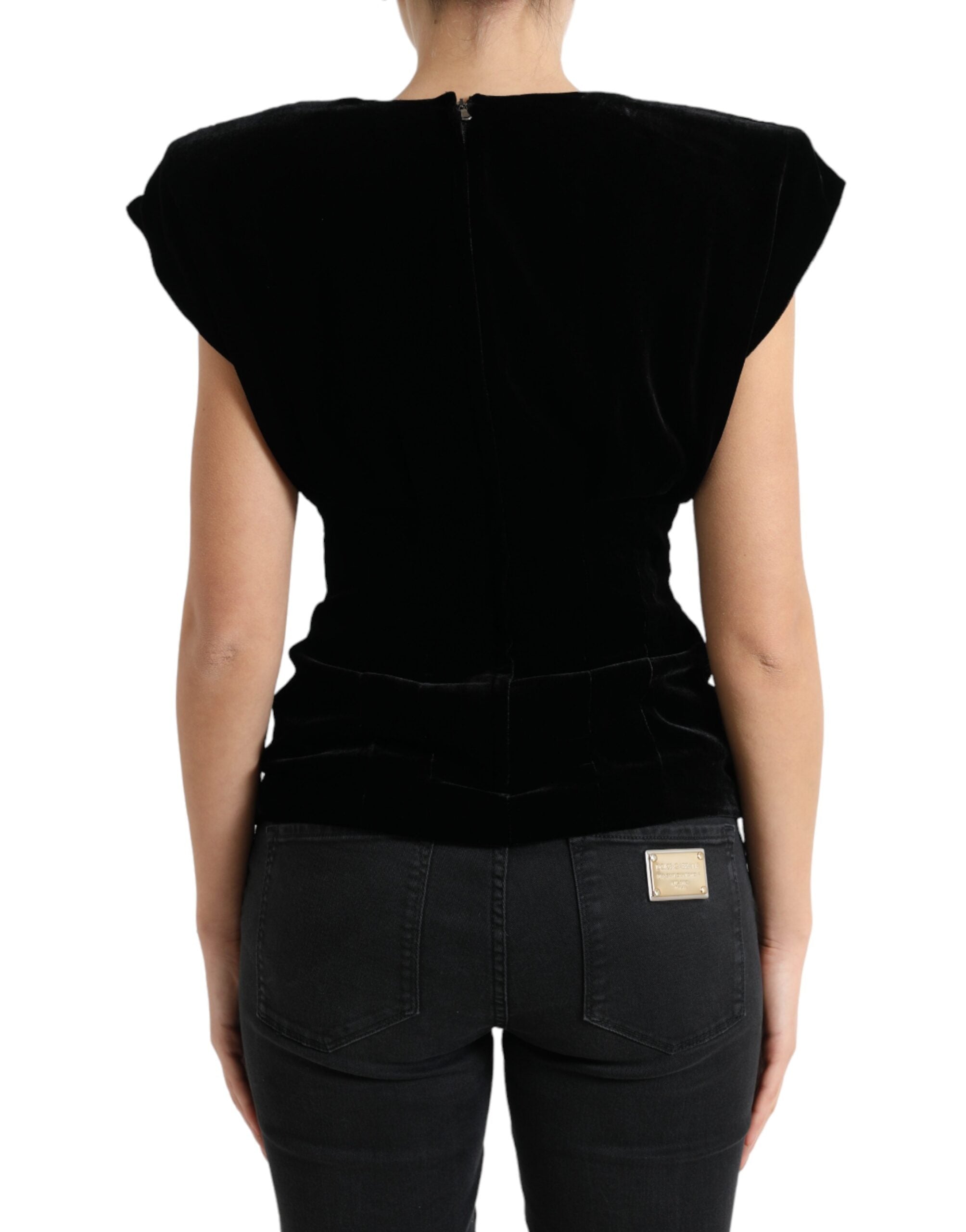 Black velvet fitted blouse with padded shoulders by Dolce & Gabbana, showcasing a sleek, elegant design with long sleeves.