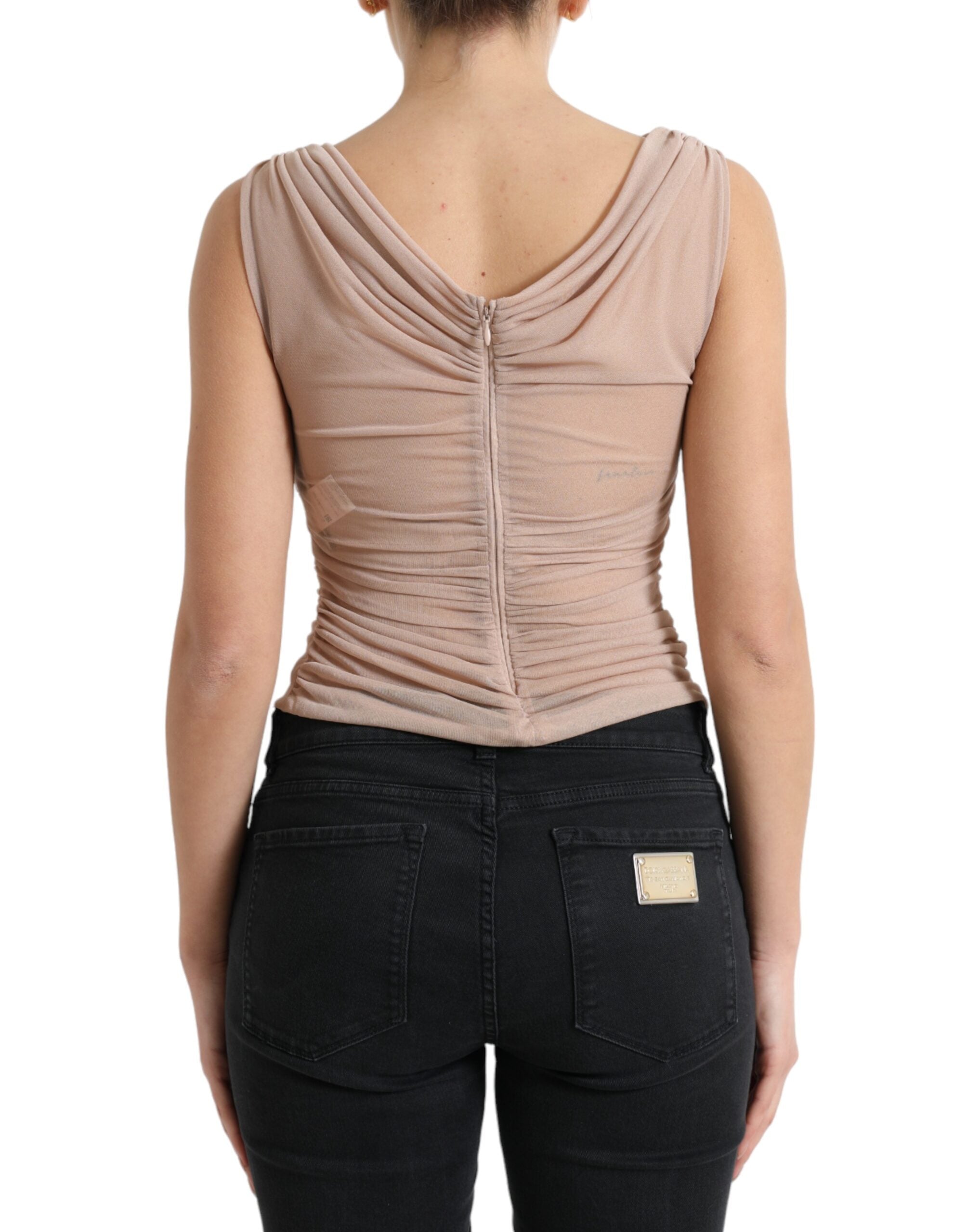 Beige viscose V-neck sleeveless tank top by Dolce & Gabbana, showing smooth fabric and classic sleeveless design.