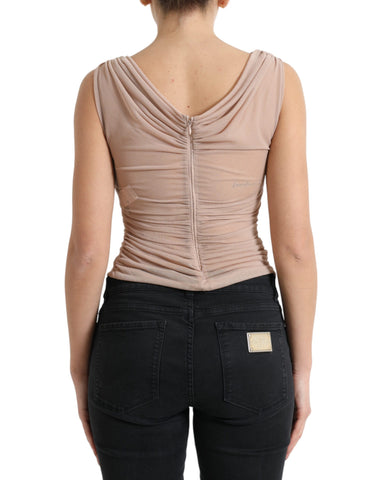 Beige viscose V-neck sleeveless tank top by Dolce & Gabbana, showing smooth fabric and classic sleeveless design.