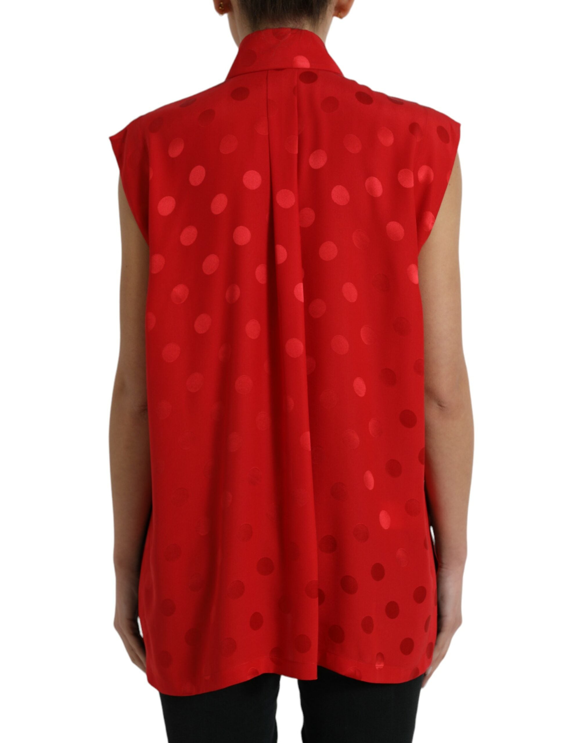 Red polka dot sleeveless collared blouse top by Dolce & Gabbana, featuring a classic design and feminine style.