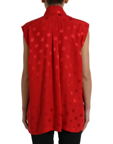 Red polka dot sleeveless collared blouse top by Dolce & Gabbana, featuring a classic design and feminine style.