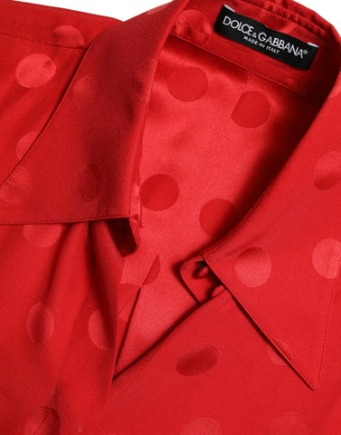 Red polka dot sleeveless collared blouse top by Dolce & Gabbana, featuring a classic design and lightweight fabric.