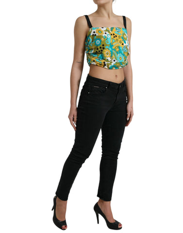 Multicolor floral sleeveless cropped top by Dolce & Gabbana, featuring vibrant flower patterns and a fitted design.