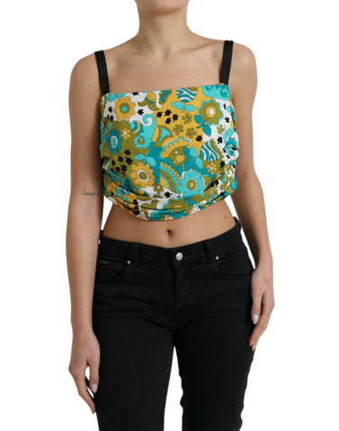 Multicolor floral sleeveless cropped top by Dolce & Gabbana with vibrant flower patterns and lightweight fabric.