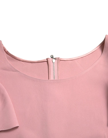 Pink short sleeve blouse with round neckline by Dolce & Gabbana, shown on a white background.