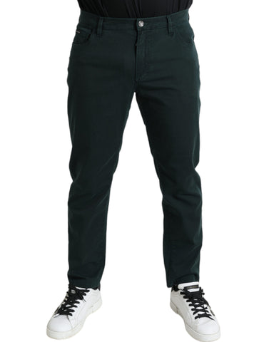 Green cotton stretch skinny men's denim jeans by Dolce & Gabbana, showcasing fitted design and classic five-pocket style.
