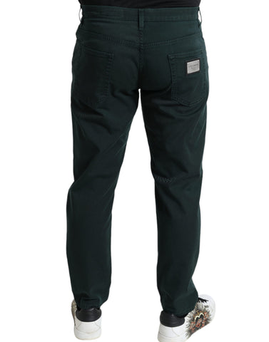 Green cotton stretch skinny men's denim jeans by Dolce & Gabbana, showing slim fit design and classic five-pocket style.