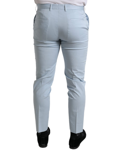 Sky blue cotton stretch skinny pants by Dolce & Gabbana, close-up of fitted pants with waistband and stitching details.