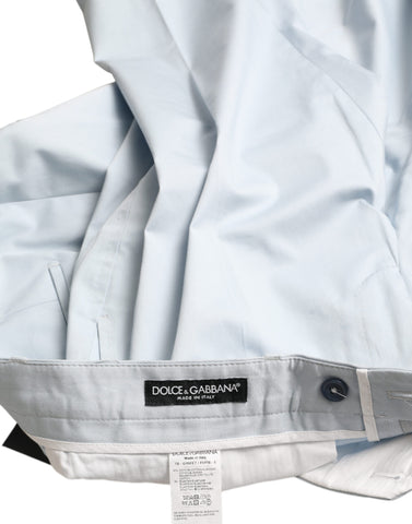Sky blue cotton stretch skinny pants by Dolce & Gabbana, close-up view showing fitted design and smooth fabric texture.