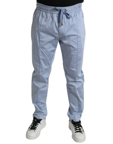 Light blue cotton stretch jogger pants by Dolce & Gabbana, featuring a relaxed fit and elastic waistband.