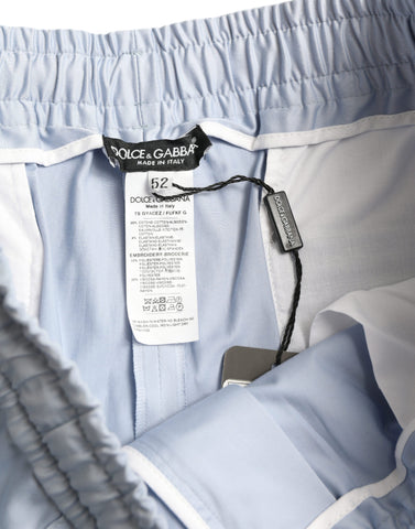 Light blue cotton stretch jogger pants by Dolce & Gabbana, featuring a relaxed fit and elastic waistband.