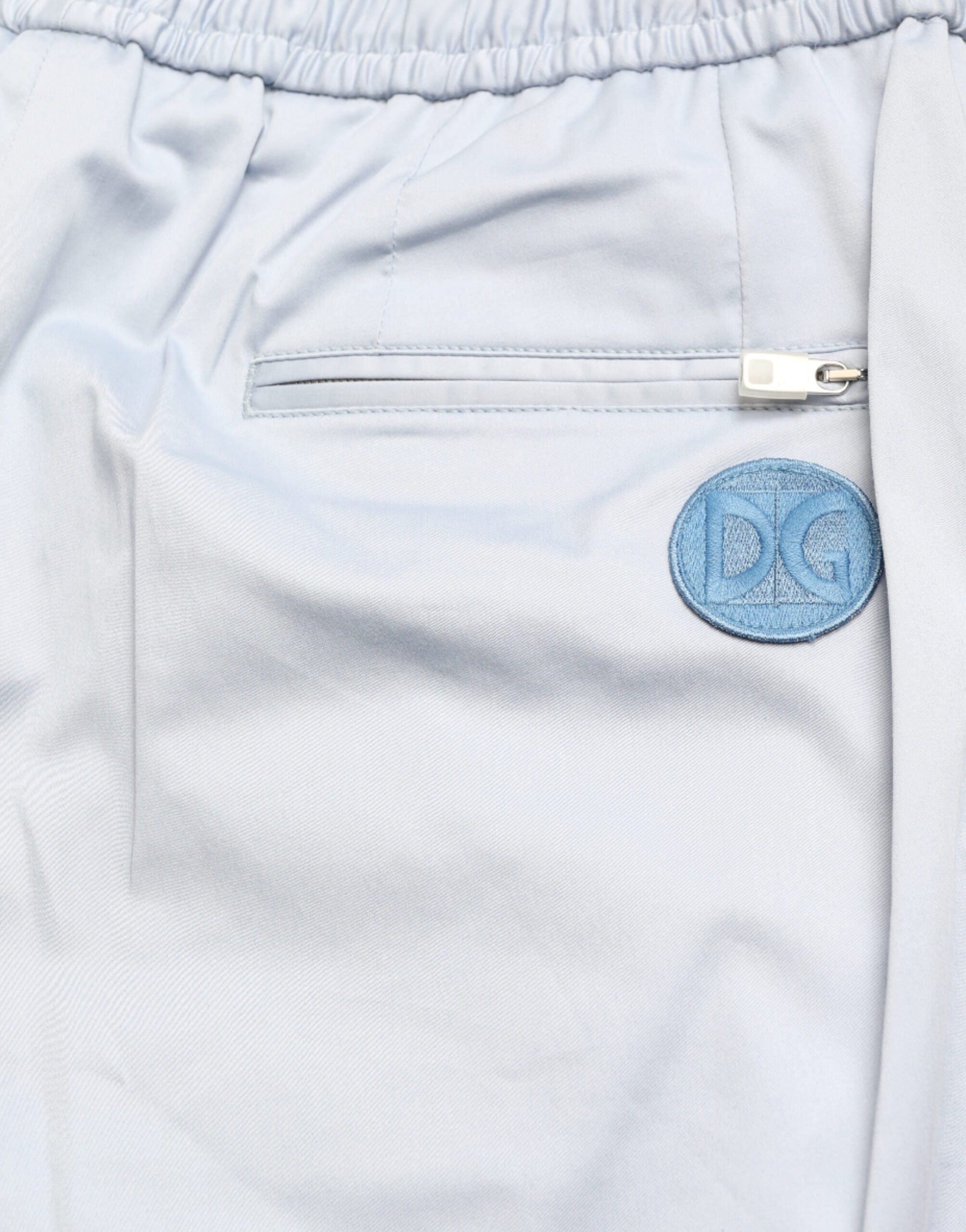 Light blue cotton stretch jogger pants by Dolce & Gabbana, featuring a relaxed fit and elastic waistband.