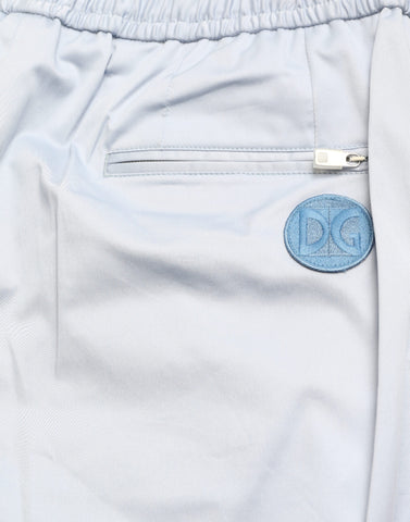 Light blue cotton stretch jogger pants by Dolce & Gabbana, featuring a relaxed fit and elastic waistband.