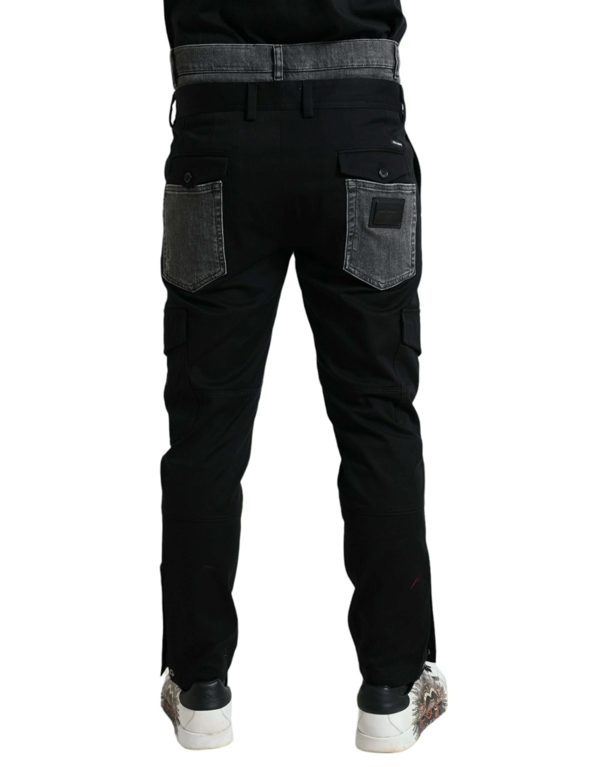 Black and gray slim cotton denim jeans pants by Dolce & Gabbana, showing a close-up of the fabric and fit.