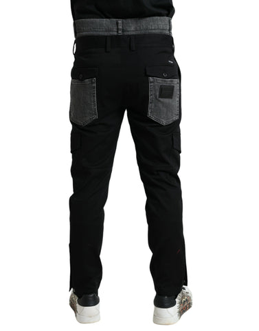 Black and gray slim cotton denim jeans pants by Dolce & Gabbana, showing a close-up of the fabric and fit.