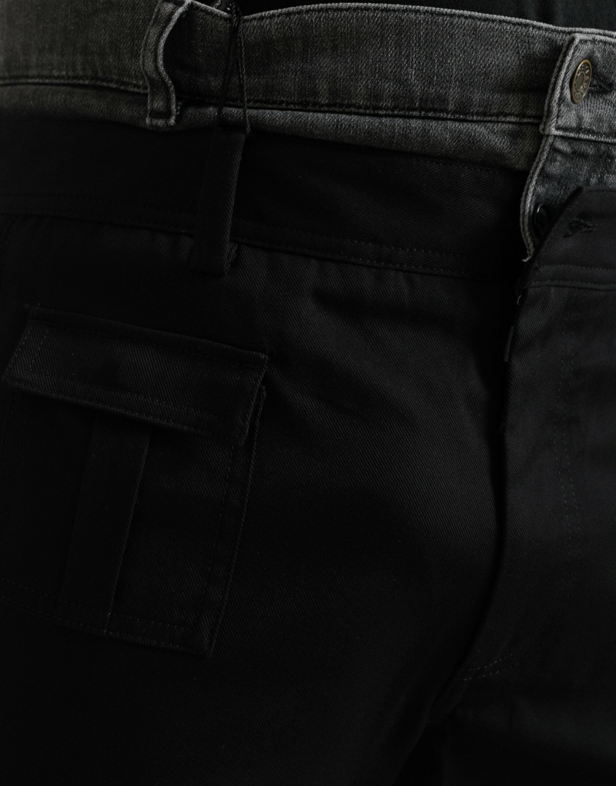 Black and gray slim cotton denim jeans by Dolce & Gabbana, featuring classic five-pocket design and modern fit.