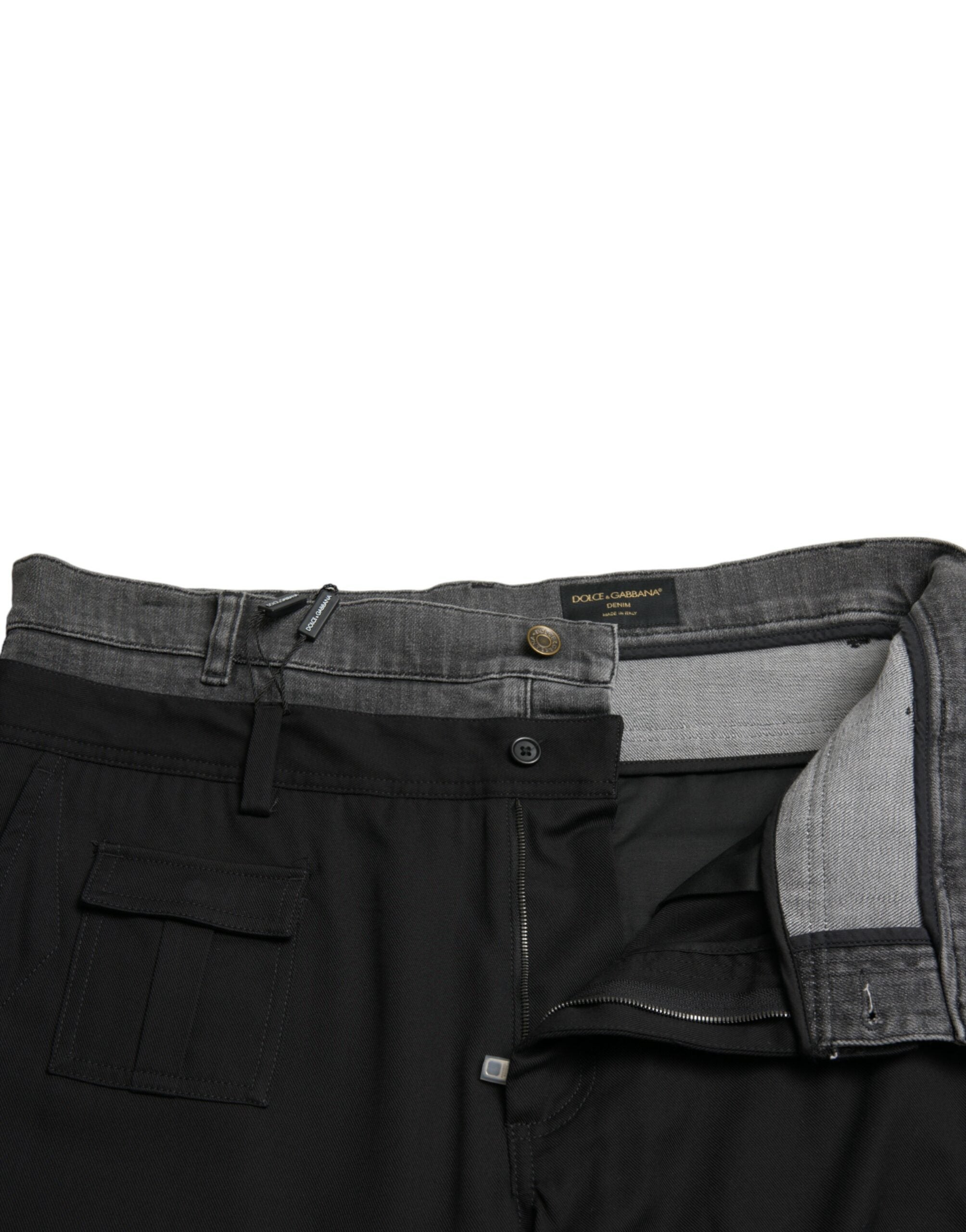 Black and gray slim fit cotton denim jeans by Dolce & Gabbana, showing detailed stitching and classic five-pocket design.