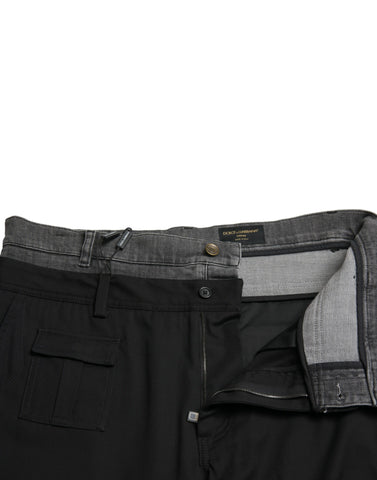 Black and gray slim fit cotton denim jeans by Dolce & Gabbana, showing detailed stitching and classic five-pocket design.
