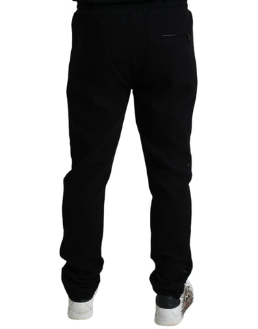 Black cotton skinny jogger sweatpants from Dolce & Gabbana with a fitted style and elastic waistband.
