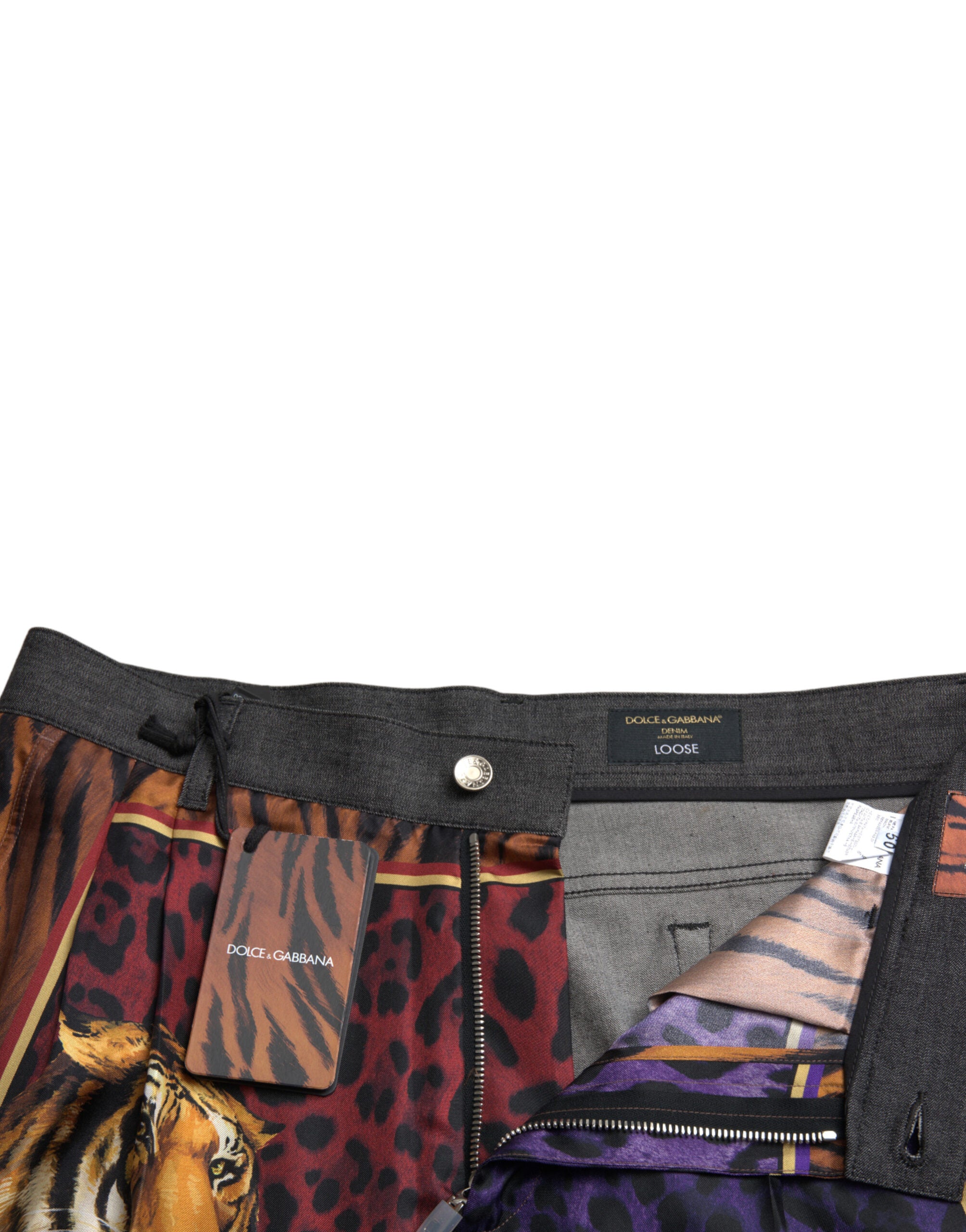 Multicolor tiger print cotton loose denim jeans by Dolce & Gabbana, featuring vibrant tiger design and relaxed fit.