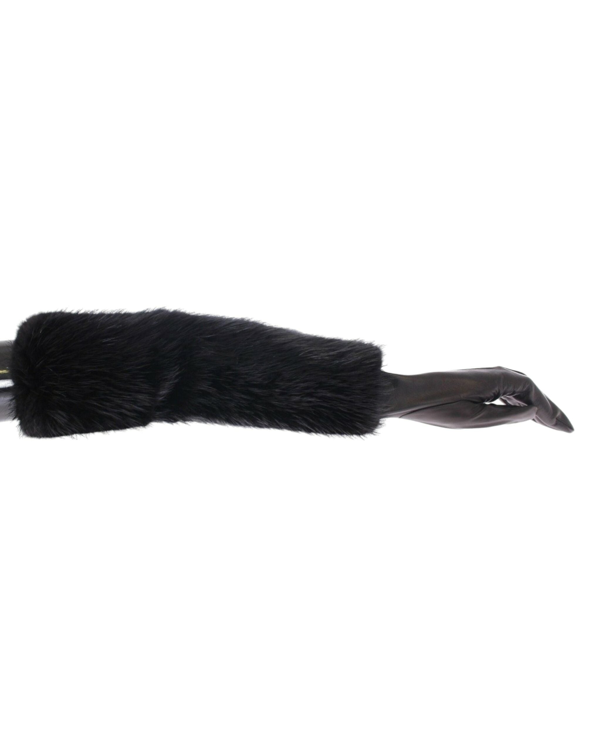 Black beaver fur and lambskin leather elbow gloves by Dolce & Gabbana, showcasing smooth leather and plush fur accents.