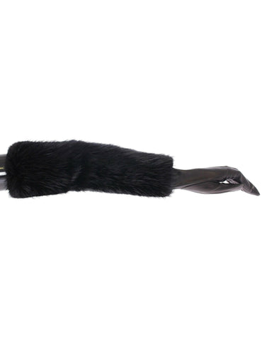 Black beaver fur and lambskin leather elbow gloves by Dolce & Gabbana, showcasing smooth leather and plush fur accents.