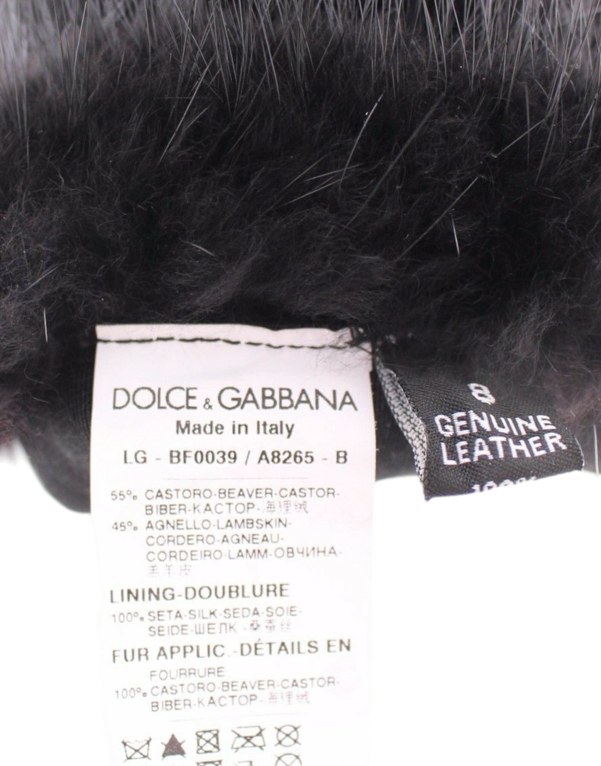 Black beaver fur and lambskin leather elbow gloves by Dolce & Gabbana, featuring a sleek, luxurious design with a smooth finish.