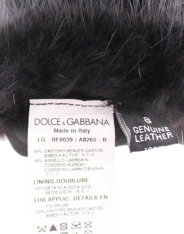 Black beaver fur and lambskin leather elbow gloves by Dolce & Gabbana, featuring a sleek, luxurious design with a smooth finish.