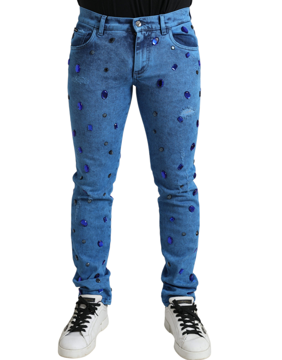 Blue crystal-embellished skinny denim jeans by Dolce & Gabbana, showcasing fitted style and detailed crystal accents.