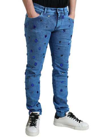 Blue crystal-embellished Dolce & Gabbana skinny denim jeans with fitted style and decorative crystal details.