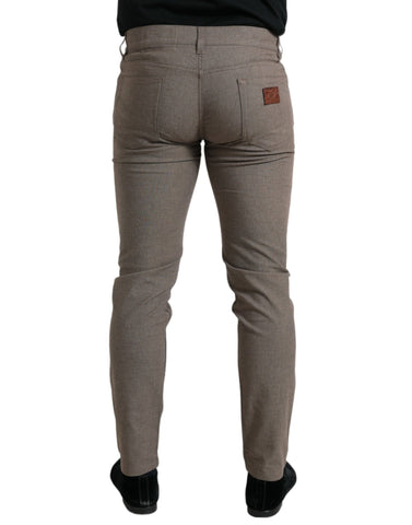 Brown cotton stretch skinny men's pants by Dolce & Gabbana shown in the image.
