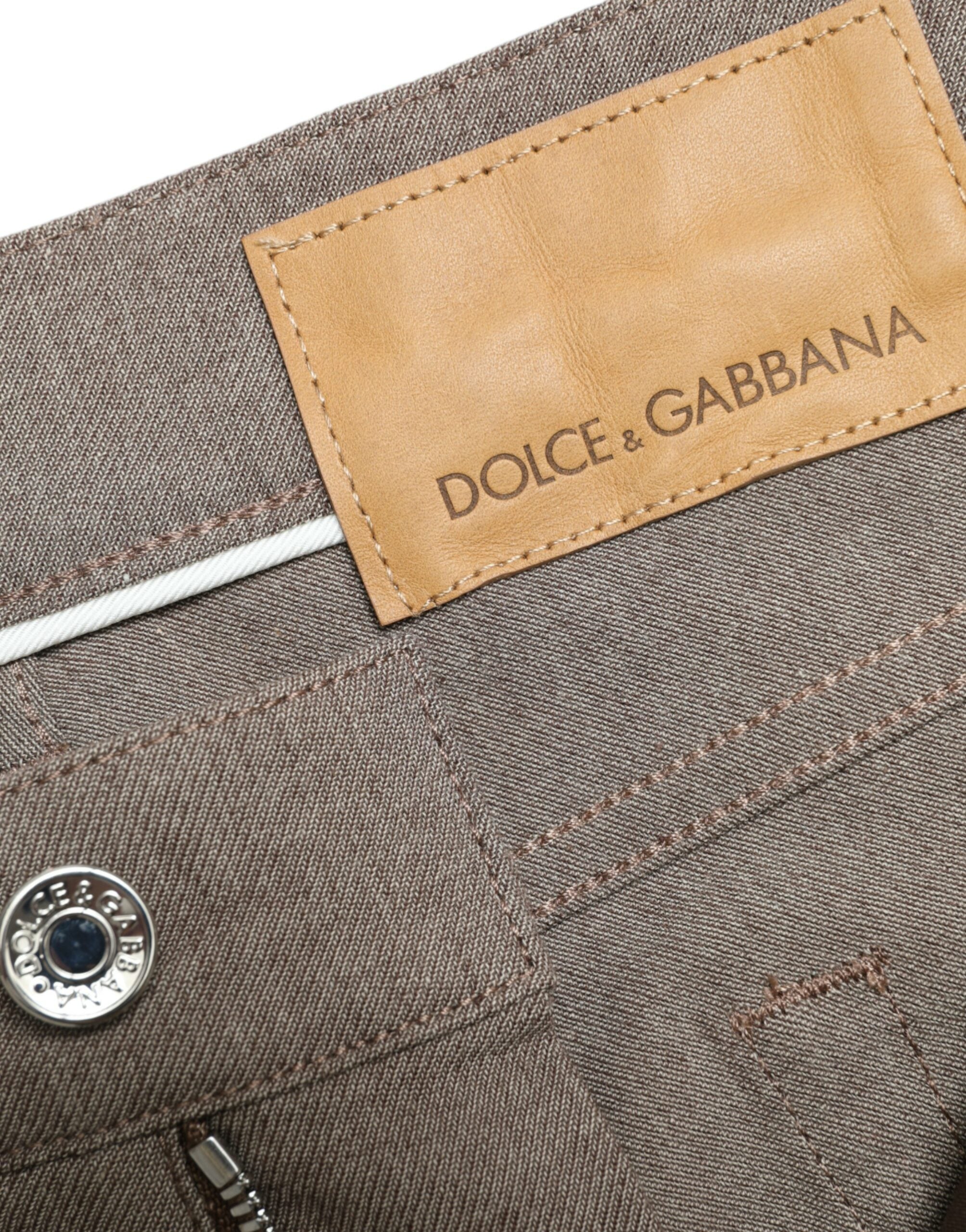 Brown cotton stretch skinny men's pants by Dolce & Gabbana, showing the fitted style and waistband detail.