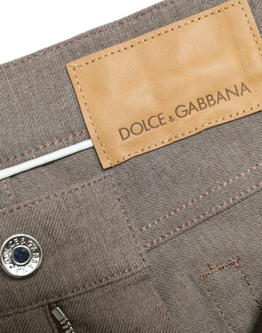 Brown cotton stretch skinny men's pants by Dolce & Gabbana, showing the fitted style and waistband detail.