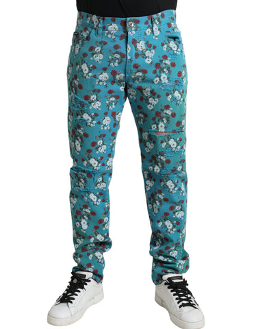 Blue floral print skinny cotton denim pants by Dolce & Gabbana, featuring a stylish floral pattern and fitted design.
